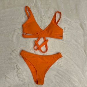 Bright orange, size small, crisscross, tie back bikini